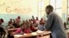 South Sudanese Teacher Working with Refugees of All Ages 