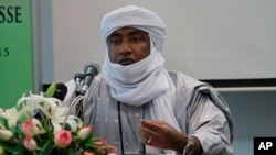 FILE - Mossa Ag Attaher, spokesman for the National Movement for the Liberation of Azawad, speaks during a press conference in Rabat, Morocco, Jan. 23, 2014. 