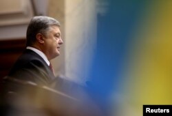 Ukrainian President Petro Poroshenko delivers a speech to parliament in Kyiv, Ukraine, Sept. 7, 2017.