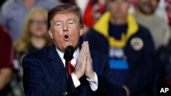 FILE - President Donald Trump speaks during a rally at the El Paso County Coliseum in El Paso, Texas, Feb. 11, 2019.