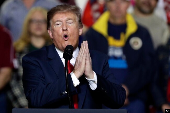 FILE - President Donald Trump speaks during a rally at the El Paso County Coliseum in El Paso, Texas, Feb. 11, 2019.