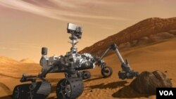 Gambar ilustrasi rover Mars milik NASA 'Curiosity' yang diperkirakan akan sampai di permukaan Mars bulan Agustus 2012.