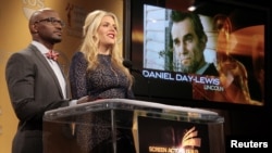 Daniel Day-Lewis is announced as a nominee for Outstanding Performance by a Male Actor in a Leading Role for "Lincoln" as actors Taye Diggs (L) and Busy Philipps announce the nominations for the 19th Annual Screen Actors Guild Awards in West Hollywood, Ca