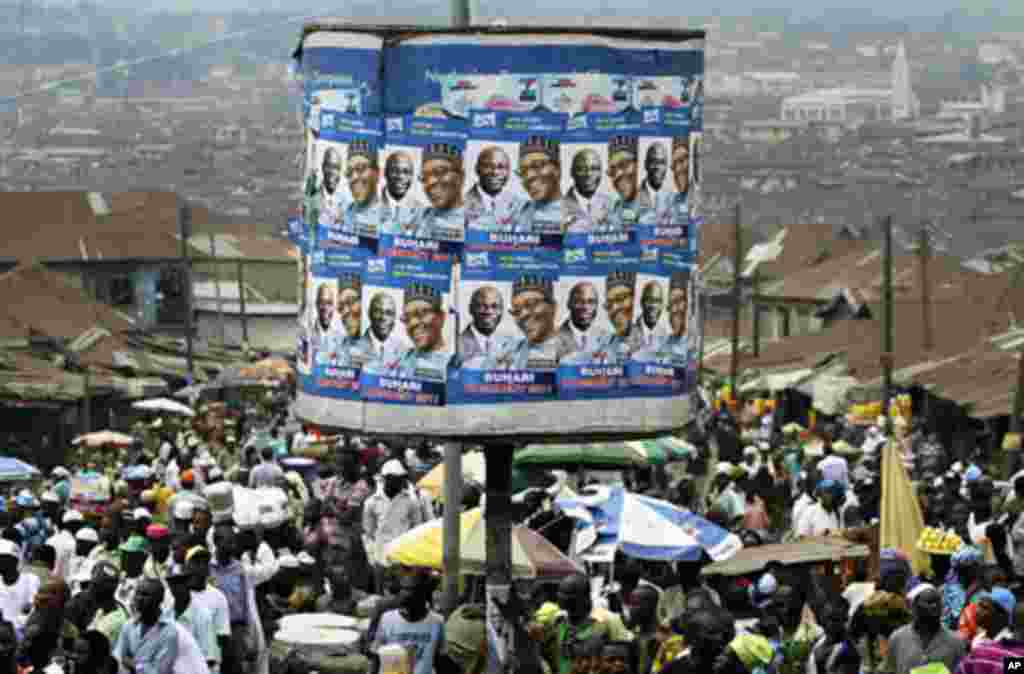 An advertisement tank is plastered with posters of former military ruler Muhammadu Buhari and his running mate Tunde Bakare during the Congress for Progressive Change (CPC) presidential campaign rally at Mapo square, Ibadan, south-west Nigeria, Mar 14 20