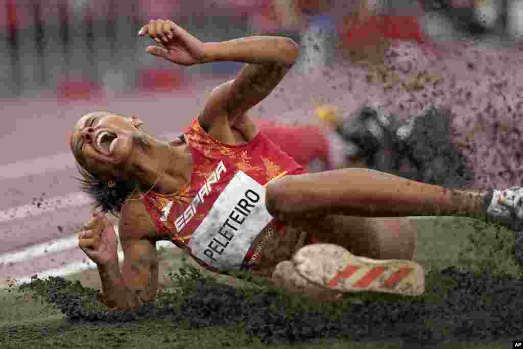 Ana Peleteiro of Spain competes in the final of the women&#39;s triple jump at the 2020 Summer Olympics in Tokyo.