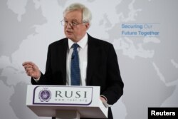 Britain's Secretary of State for Departing the EU David Davis delivers a speech on Britain's security relationship with the EU after Brexit, in London, June 6, 2018.