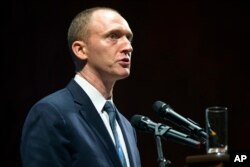 FILE - In this July 8, 2016, photo, Carter Page, then adviser to U.S. Republican presidential candidate Donald Trump, speaks at the graduation ceremony for the New Economic School in Moscow, Russia.