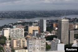 FILE - Buildings are seen in the Plateau district in Abidjan, Ivory Coast, Sept. 11, 2015.