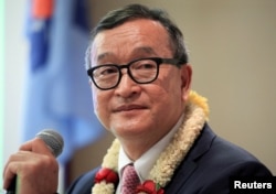 FILE - Sam Rainsy delivers a speech to members of the Cambodia National Rescue Party (CNRP) at a hotel in metro Manila, Philippines, June 29, 2016.