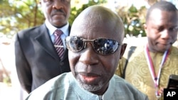 Ousainou Darboe of the United Democratic Party speaks to journalists in Serrekunda, Gambia, November 24, 2011.