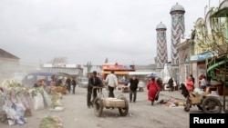 FILE - A view of a local market in the ancient city of Uzgen in southern Kyrgyzstan. 
