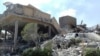 This photo released by the Syrian official news agency SANA shows the damage of the Syrian Scientific Research Center, which was attacked by U.S., British and French military strikes to punish President Bashar al-Assad for suspected chemical attack agains