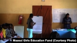 Gloria Kotente Mumeita, a Maasai medical student at the University Of Nairobi School Of Medicine in Kenya conducts a mentoring workshop for Maasai students in the Kajiado district of Kenya, thanks to the Maasai Girls Education Fund.