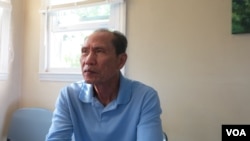 Pheng Ang, a former Cambodian refugee and currently a staff of Lowell Public School, talks to VOA Khmer at his home in Lowell, Massachusetts, on Wednesday, September 7, 2016. (Ten Soksreinith/VOA Khmer)