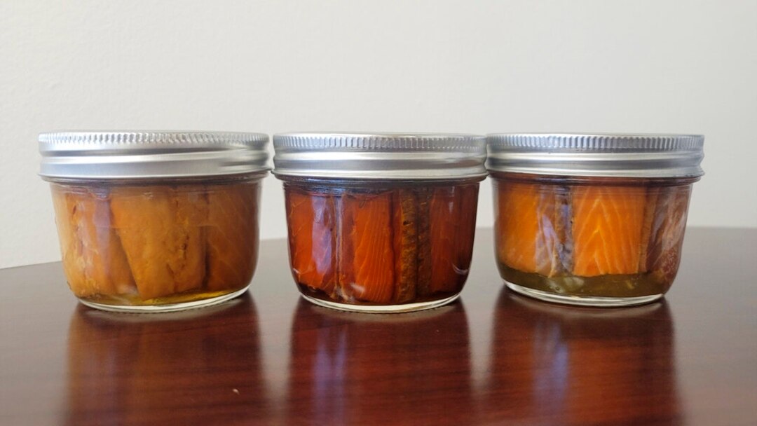 Salmon sits in jars in the offices of the Tanana Chiefs Conference in Fairbanks, Alaska, Sept. 29. 2021. Families traditionally spend the summer at fish camps to snag adult salmon as they migrate inland to spawn. (Tanana Chiefs Conference)