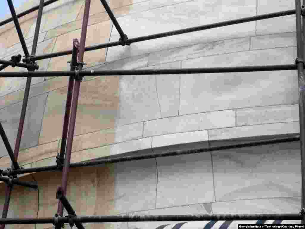 This close-up image shows the contrast between cleaned and discolored marble in the Taj Mahal complex. New research shows that the brownish discoloration is caused by particles of carbon, and dust.