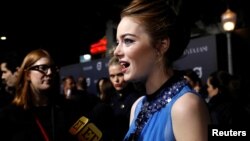 Cast member Emma Stone is interviewed at the premiere of "La La Land" in Los Angeles, Dec. 6, 2016. The musical was named one of 2016's top 10 movies by the American Film Institute, Thursday, Dec. 8, 2016. 