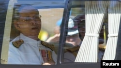 Thailand's King Bhumibol Adulyadej arrives for Coronation Day at Klai Kangwon Palace, Hua Hin, Prachuap Khiri Khan province, Thailand, on May 5, 2014. 