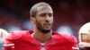 NFL Quarterback Refuses to Stand for National Anthem in Protest