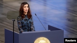 Nadia Murad menyampaikan pidatonya dalam penganugerahan Hadiah Nobel Perdamaian di Balai Kota Oslo di Oslo, Norwegia, 10 Desember 2018.