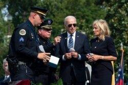 President Joe Biden and first lady Jill Biden attend ceremony honoring fallen law enforcement officers at the 40th annual National Peace Officers' Memorial Service at the U.S. Capitol in Washington, Oct. 16, 2021.