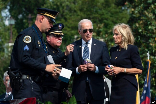 President Joe Biden and first lady Jill Biden attend ceremony honoring fallen law enforcement officers at the 40th annual National Peace Officers' Memorial Service at the U.S. Capitol in Washington, Oct. 16, 2021.