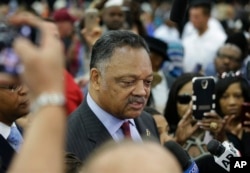 American civil rights activist Jesse Jackson speaks to members of the media before Muhammad Ali's Jenazah, a traditional Muslim service, at Freedom Hall in Louisville, Ky., June 9, 2016.
