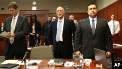 George Zimmerman, far right, stands for the judge's arrival with, from left, defense attorney Mark O'Mara and co-defense counsel Don West in Seminole Circuit Court in Sanford, Florida, June 24, 2013.