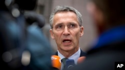 FILE - NATO Secretary-General Jens Stoltenberg is seen speaking at a press conference in Brussels.