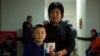 China Lets 2,000 Kazakhs Leave Xinjiang, Return Home