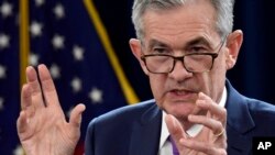 Le président de la Réserve fédérale, Jerome Powell, s'exprimant lors d'une conférence de presse à Washington, le mercredi 26 septembre 2018. 