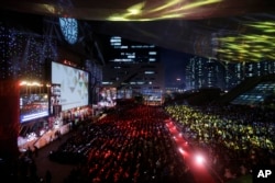 People attend the opening ceremony of the Busan International Film Festival at Busan Cinema Center in Busan, South Korea, Oct. 1, 2015.
