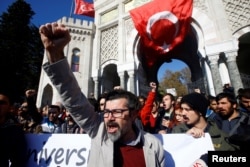 FILE - Demonstrators protest against a purge of thousands of education staff since an attempted coup in July in front of the Istanbul University, Nov. 3, 2016.
