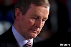 Irish Prime Minister Enda Kenny pauses before speaking to the media at the general election count center in Castlebar, Ireland, Feb. 27, 2016.