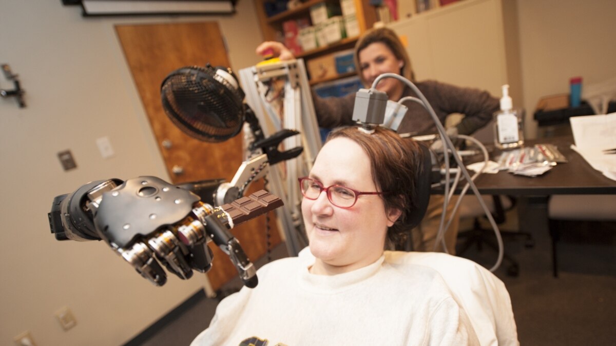 Paralyzed Woman Moves Prosthetic Arm with Her Brain