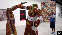 FILE - Installation by Nigerian artist Yinka Shonibare at the 52nd Biennale in Venice, Italy, June 2007.