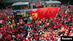 Members of the National Union of Metalworkers (NUMSA) march on the first day of a nationwide strike in Johannesburg, July 1, 2014.