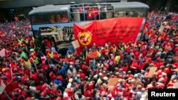 Members of the National Union of Metalworkers (NUMSA) march on the first day of a nationwide strike in Johannesburg, July 1, 2014.