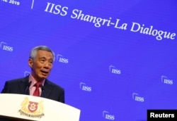 Singapore's Prime Minister Lee Hsien Loong delivers a keynote address at the IISS Shangri-la Dialogue in Singapore, May 31, 2019.
