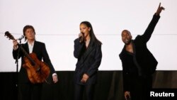 Paul McCartney, Rihanna and Kanye West (R) perform "FourFiveSeconds" at the 57th annual Grammy Awards in Los Angeles, California, February 8, 2015. 