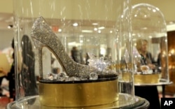 A Jimmy Choo shoe, from the Disney-curated collection of nine luxury designer shoes re-imagining the iconic glass slipper from "Cinderella," is for sale exclusively at Saks Fifth Avenue in New York, March 9, 2015.