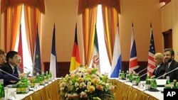 EU foreign policy chief Catherine Ashton, left, and chief Iranian nuclear negotiator Saeed Jalili, right, meet in Moscow, on Monday, June 18, 2012, before the start of the high-stakes talks on the controversial Iranian nuclear programme. Negotiators from