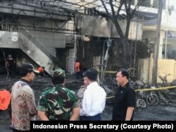 President Joko Widodo visiting the location of a bomb attack in Surabaya.