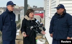 U.S. Sen. Susan Collins, R-Maine, addresses reporters after a ribbon-cutting at a U.S. Coast Guard regional command center, Feb. 20, 2019, in South Portland, Maine. Collins said that she would vote for a congressional resolution disapproving of President Donald Trump's emergency declaration to build a wall on the southern border.