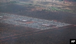 FILE - parts of Dadaab, the world's largest refugee camp, are seen from a helicopter in northern Kenya.
