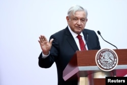 FILE - Mexico's President Andres Manuel Lopez Obrador gives a speech at the National Palace in Mexico City, Mexico, March 11, 2019.