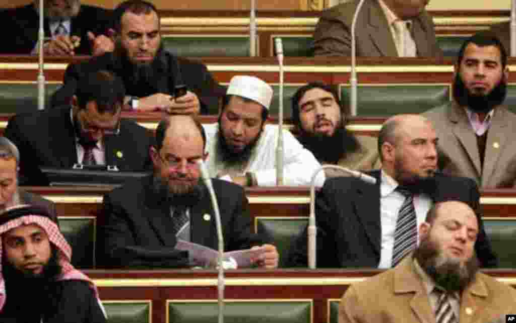 Salafi members of parliament are seen during the first Egyptian parliament session, after a revolution ousted former President Hosni Mubarak, in Cairo January 23, 2012. Egypt's parliament opened on Monday for the first time since a historic free election 