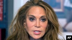 FILE - Conservative blogger Pamela Geller speaks during an interview at Associated Press offices in New York, May 7, 2015. David Wright was convicted in October 2017 of plotting to behead Geller and kill other Americans on behalf of the Islamic State group; on Dec. 19, 2017, he was sentenced to 28 years in federal prison.