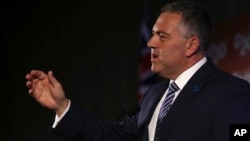 Australia's Treasurer Joe Hockey delivers a closing statement to the media during a press conference at the G-20 Finance Ministers and Central Bank Governors meeting in Sydney, Australia, Feb. 23, 2014.