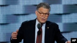 Minnesota Senator Al Franken's jokes are met with laughter from the audience